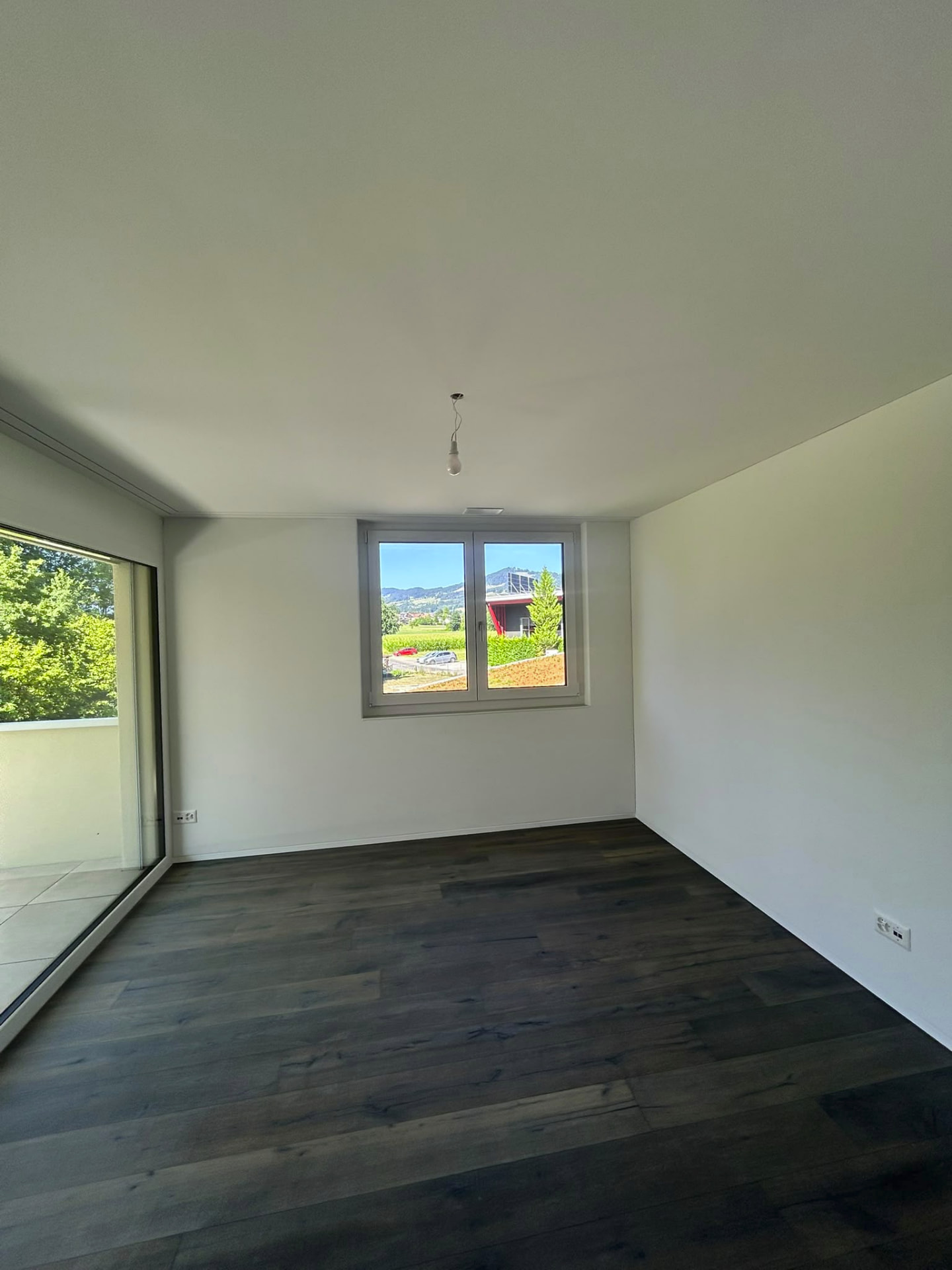 Zimmer mit Balkonzugang